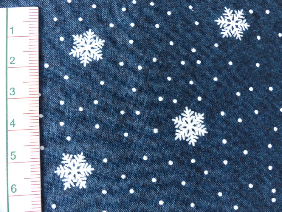 Preview: Patchworkstoff Schneesterne, blauer Untergrund mit Maß